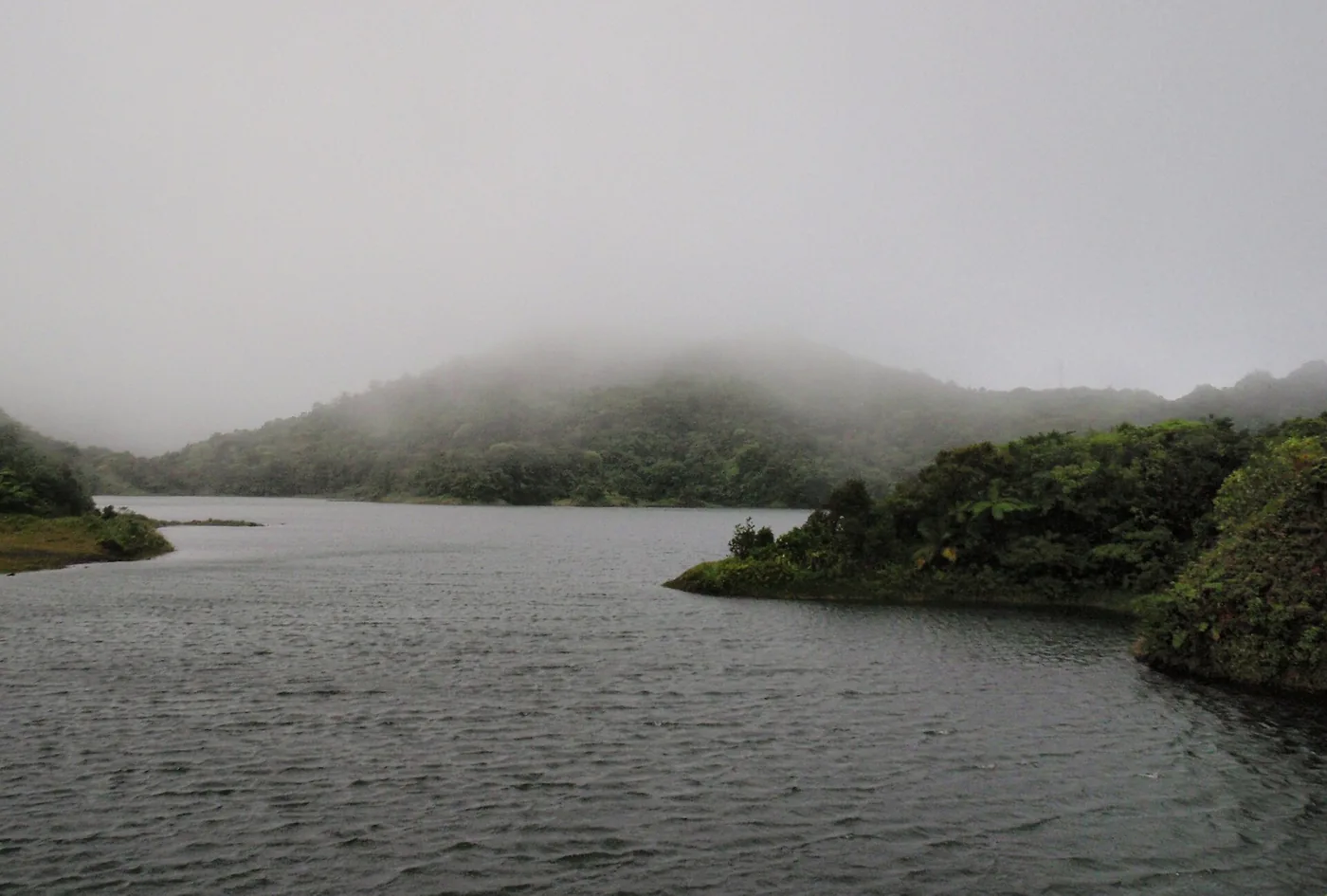 Mist over Freshwater Lake and the forested ridges of Morne Trois Pitons National Park, Dominica
